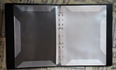40 plastic sleeves inside