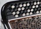 Detail of treble keyboard<br>with textured F and C buttons